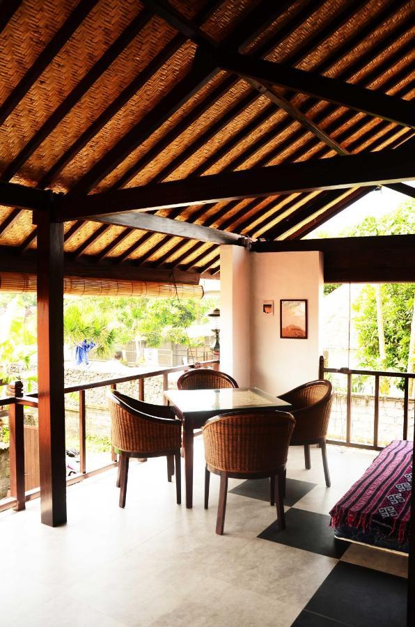 Capung Guesthouse Джимбаран Экстерьер фото