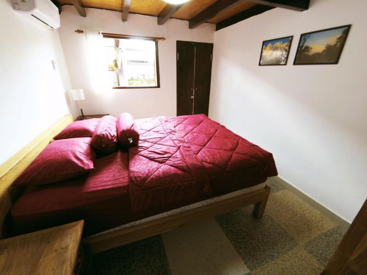 Capung Guesthouse Джимбаран Экстерьер фото
