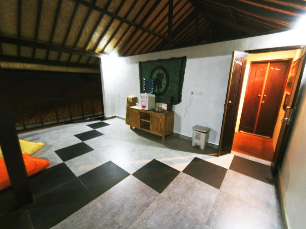 Capung Guesthouse Джимбаран Экстерьер фото